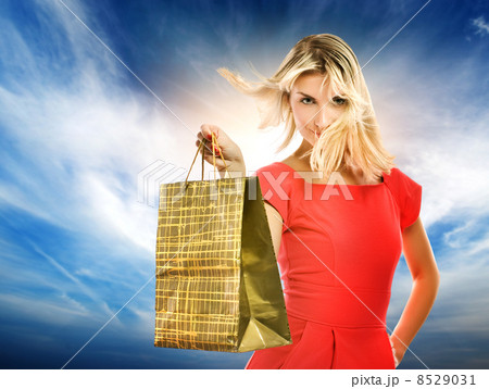Beautiful young woman with a bag Beautiful young woman with a bag 8529031