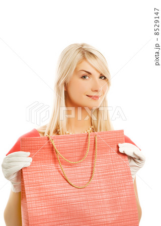 Beautiful young woman with a bag. Isolated on white background 8529147
