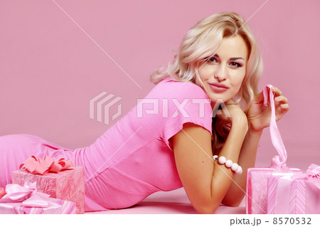 Blond girl with gifts 8570532