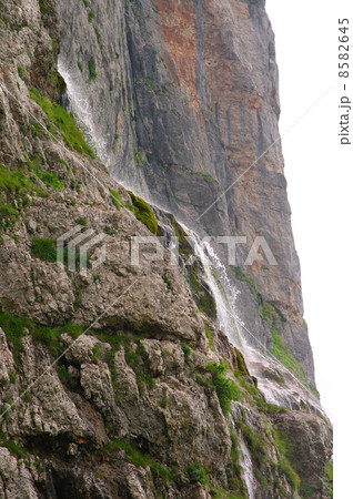 Waterfall in rocky Mountains Caucasus High view sideways Waterfall in rocky Mountains Caucasus High view sideways 8582645