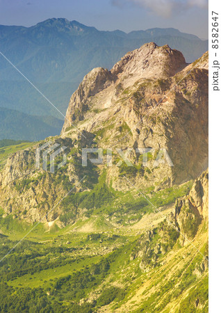 Rocky Mountains in Caucasus and green valley Landscape Summer day Rocky Mountains in Caucasus and green valley Landscape Summer day 8582647