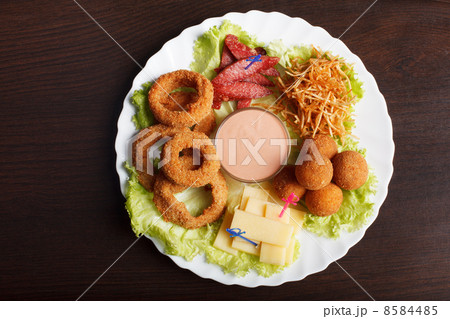 Image of crispy flavored snacks on plate Image of crispy flavored snacks on plate 8584485