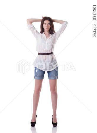 Image of tall brunette posing in casual clothes 8584501