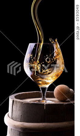 Cognac or brandy on a black 8593049