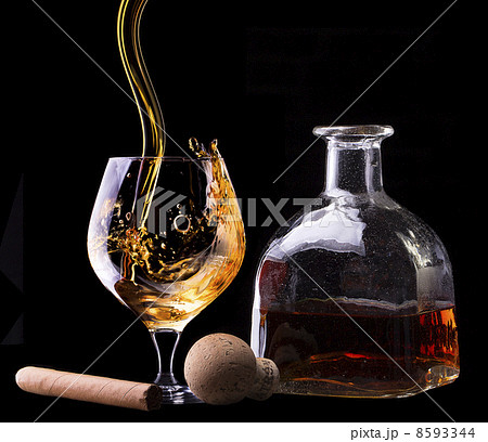 Cognac and Cigar on black Cognac and Cigar on black 8593344