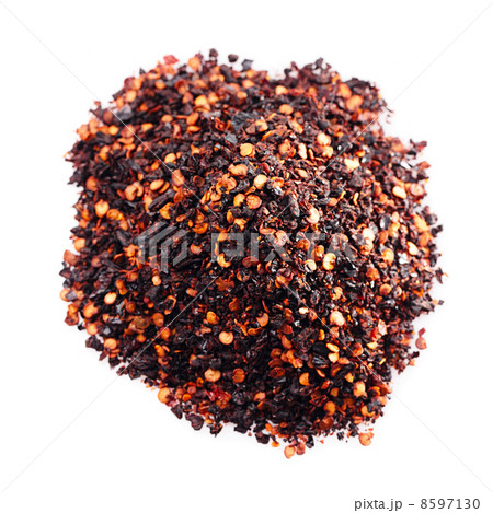 chipotle - jalapeno smoked chili flakes isolated pile chipotle - jalapeno smoked chili flakes isolated pile 8597130