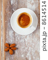 espresso coffee and almonds on old rustic table 8614514