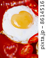 fried egg with heart shape yolks and heart shaped bokeh 8614516