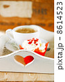 red festive muffin and coffe, on wooden tray 8614523