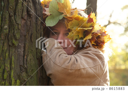 sad mature woman near tree 8615883