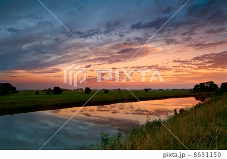 sunrise on Dutch river 8631150