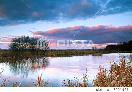 dramatic sky at sunrise bu pond 8631928