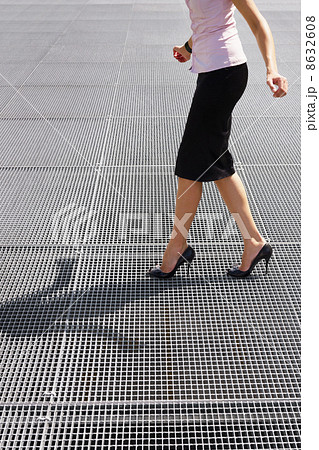 balancing on high heels 8632608