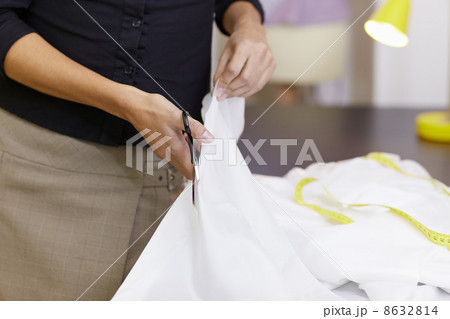 Woman working in fashion design studio Woman working in fashion design studio 8632814