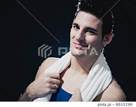 male athlete smiling and looking at camera 8633296