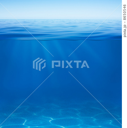 sea or ocean water surface with underwater split by waterline sea or ocean water surface with underwater split by waterline 8650546