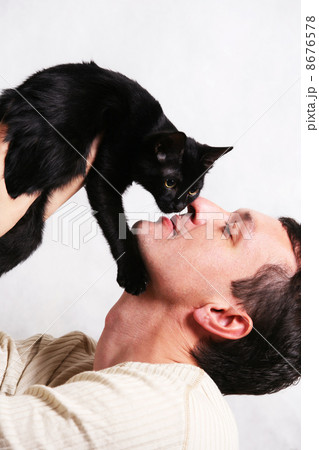 Portrait with a cat 8676578