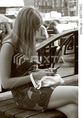 Girl with the mobile phone Girl with the mobile phone 8677961