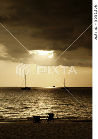 Drifting boat on a sunset 8681366