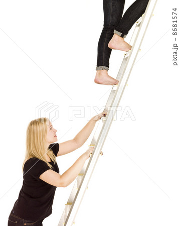 Women climbing up the ladder Women climbing up the ladder 8681574