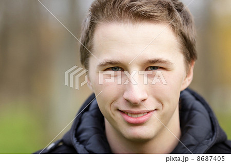 Young attractive man outdoor portrait 8687405