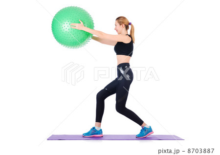 Young woman with ball exercising on white 8703887