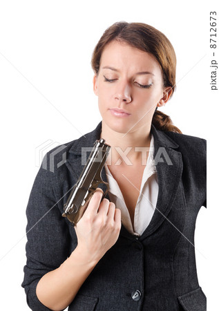 Woman businewoman with hand gun 8712673