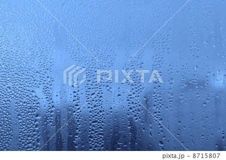 Natural water drops on glass 8715807