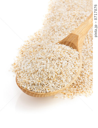 barley  in spoon on white 8717876