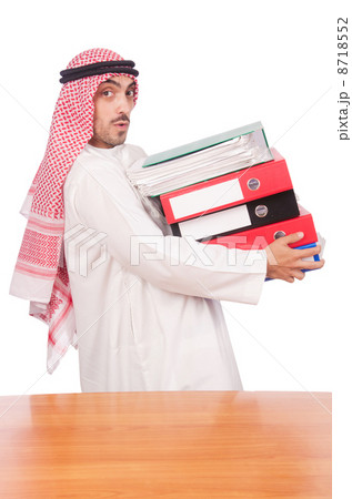 Arab businessman with many folders on white 8718552