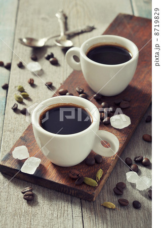 Coffee in cups with spices Coffee in cups with spices 8719829
