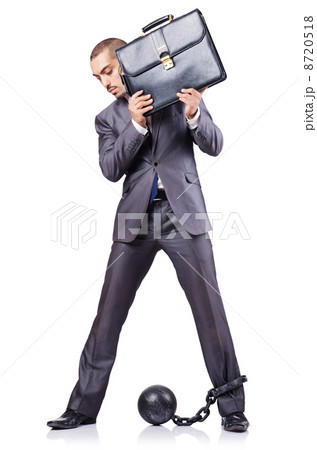 Businessman with shackles on white Businessman with shackles on white 8720518