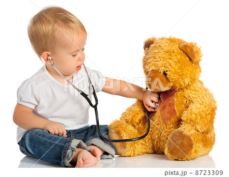 baby plays in doctor toy bear and stethoscope baby plays in doctor toy bear and stethoscope 8723309