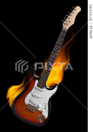electric guitar on fire isolated on black 8735340