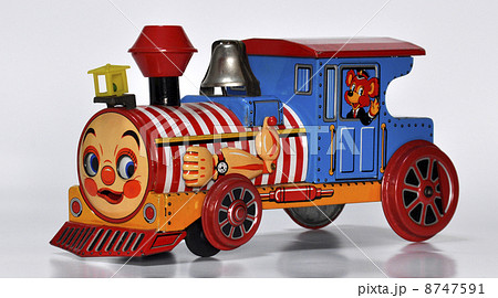 ブリキのおもちゃ 顔つき蒸気機関車3 昭和30年代の写真素材