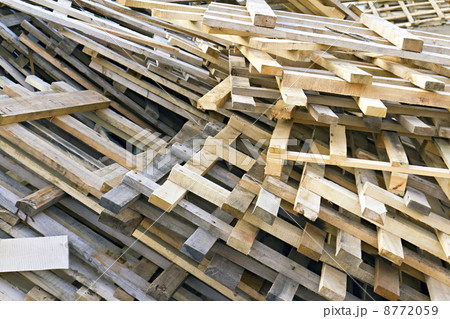 piled into a heap of wooden pallets piled into a heap of wooden pallets 8772059