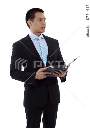 Asian business man using digital tablet computer 8774416