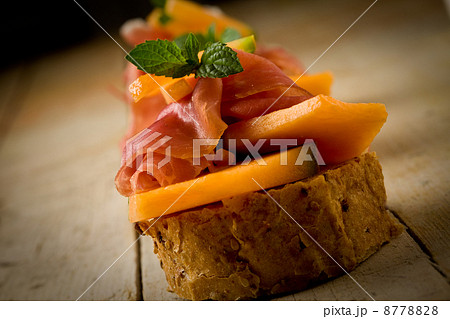 Ham and melon appetizer 8778828