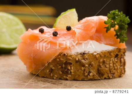 Slice of Bread with creme fraiche and smoked salmon 8779241