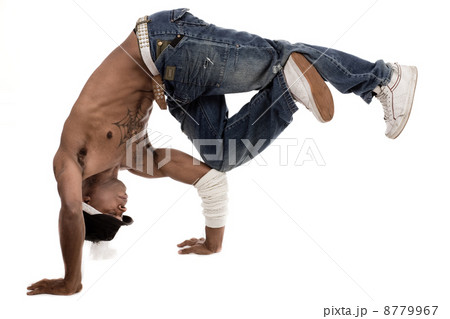 Dancer balancing his knees with his elbows Dancer balancing his knees with his elbows 8779967