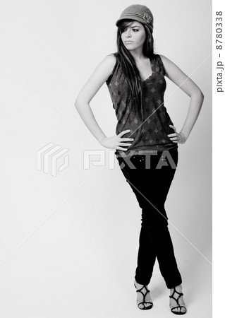 Full length black and white image of a brunette model 8780338