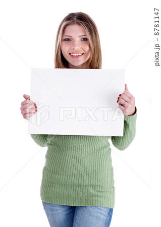 Smiling young beautiful girl holding blank white board Smiling young beautiful girl holding blank white board 8781147