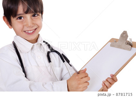 Little boy doctor writes on his clipboard for diagnosis Little boy doctor writes on his clipboard for diagnosis 8781715