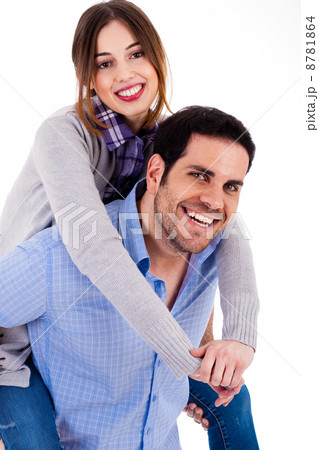 Cheerful young couple piggybacking 8781864