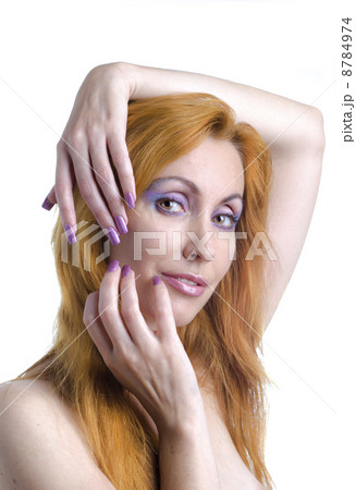 Portrait of the young woman with a make-up in pink tones and with long nails 8784974