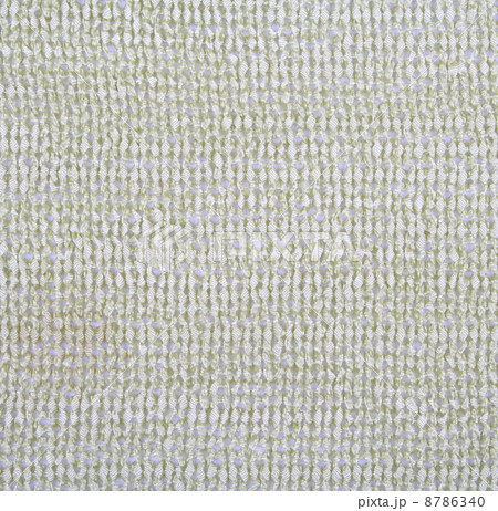 Golden knitted textured as background 8786340