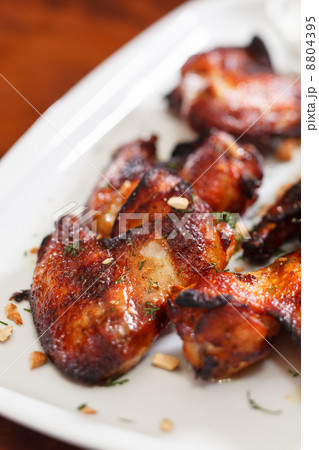 Chicken wings with sauce Chicken wings with sauce 8804395