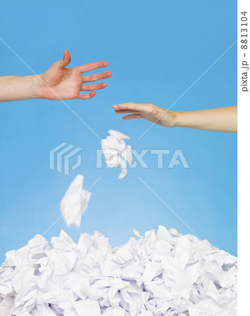 Hands trowing papers 8813104