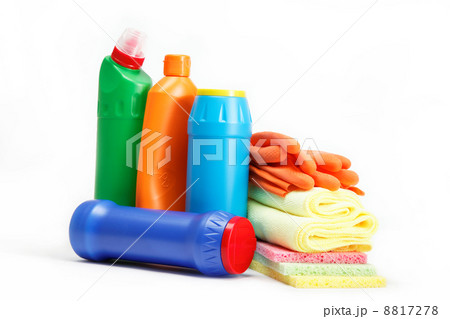 Detergent bottles, rubber gloves and cleaning sponge on a white 8817278