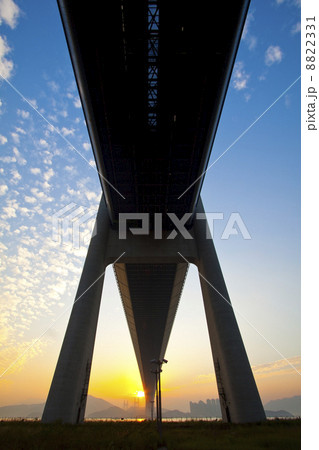Tsing Ma Bridge landmark in Hong Kong under sunset 8822331